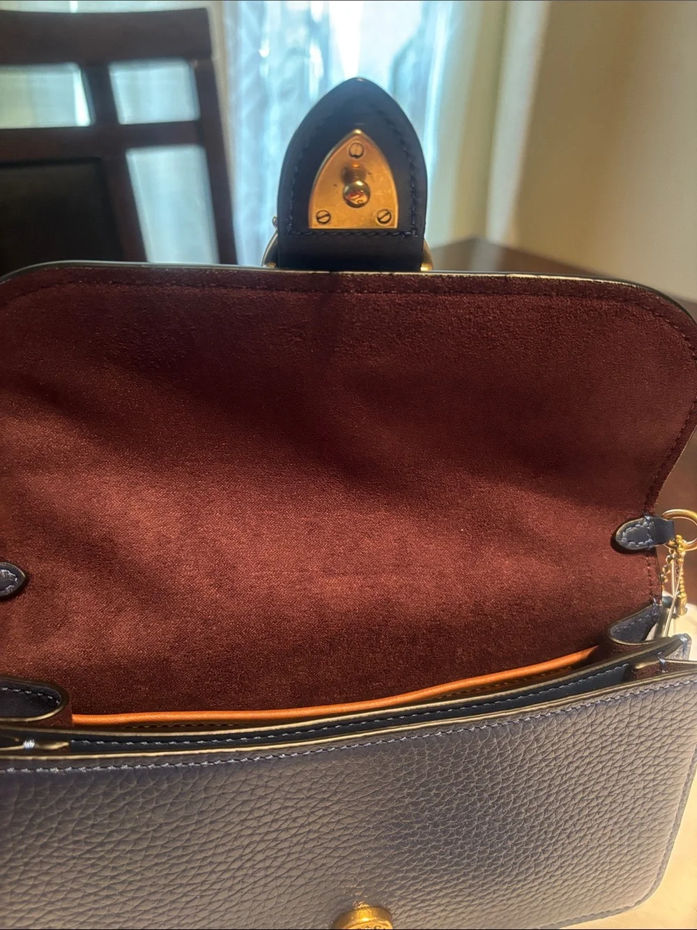 Coach sleek leather